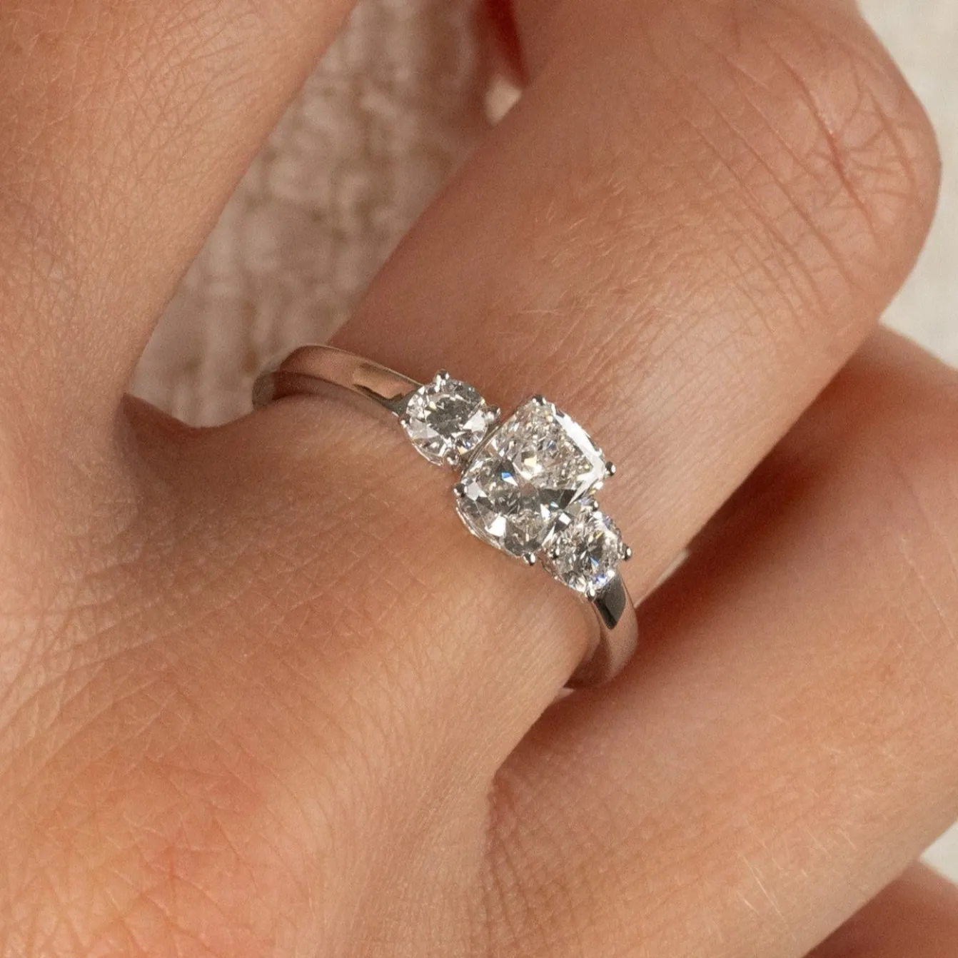RECTANGULAR CUSHION-CUT THREE-STONE DIAMOND RING - 1.15ct - WG