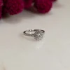 ROUND HALO ALLIANCE DIAMOND RING - 0.85ct - WG