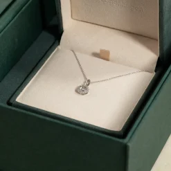 ROUND HALO DIAMOND PENDANT - 0.66ct - WG