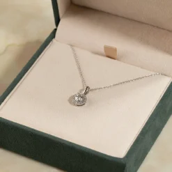 ROUND HALO DIAMOND PENDANT - 0.66ct - WG