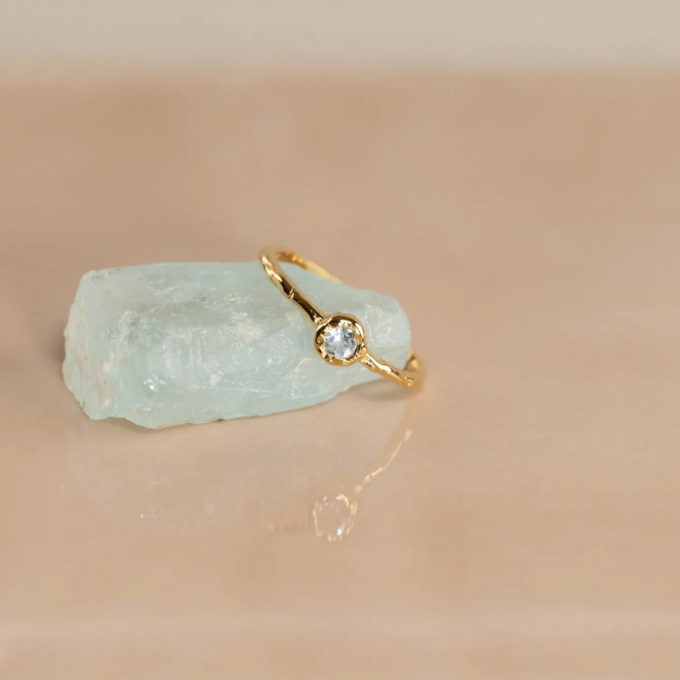 SELENE BLUE TOPAZ GOLDEN RING