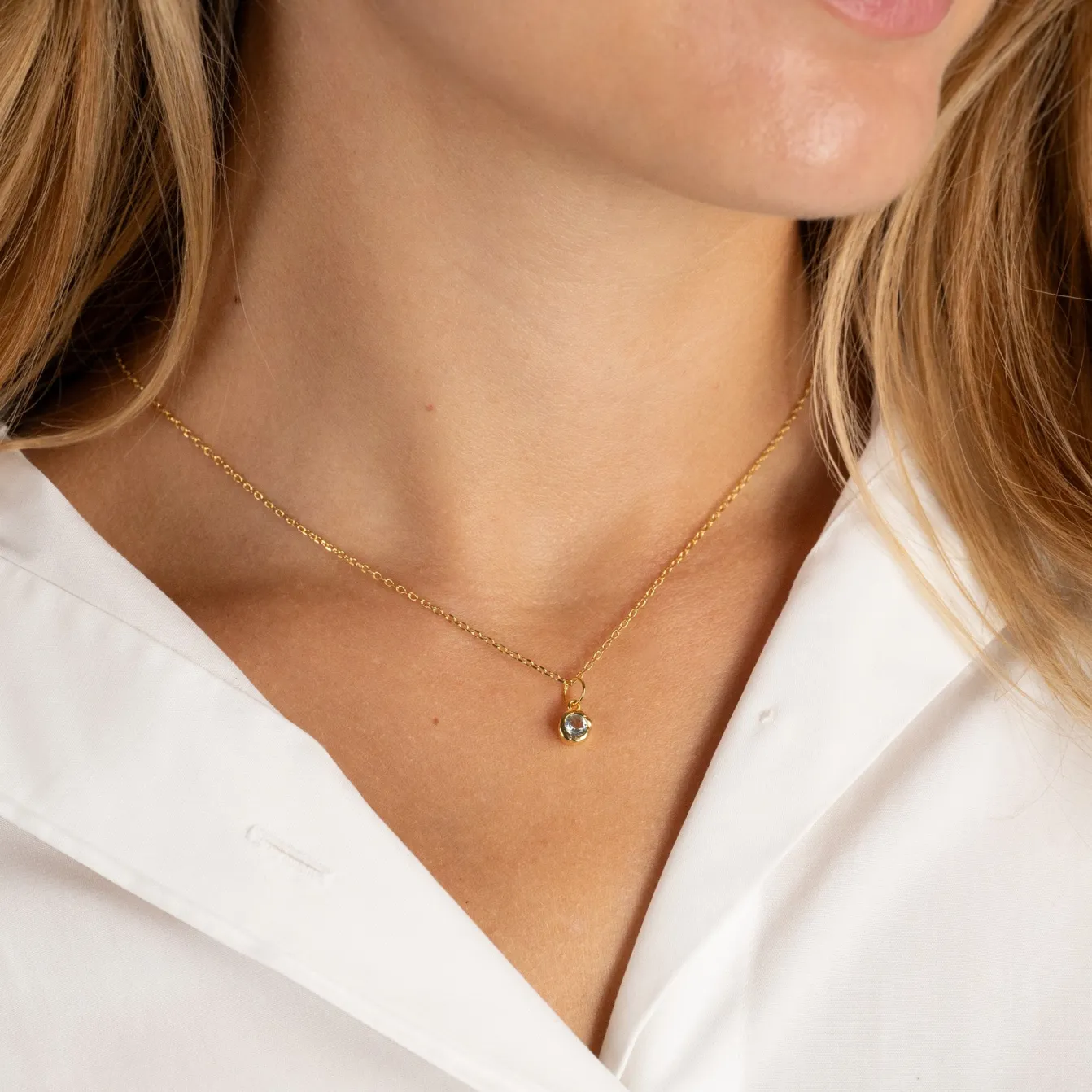 SELENE BLUE TOPAZ GOLDEN PENDANT
