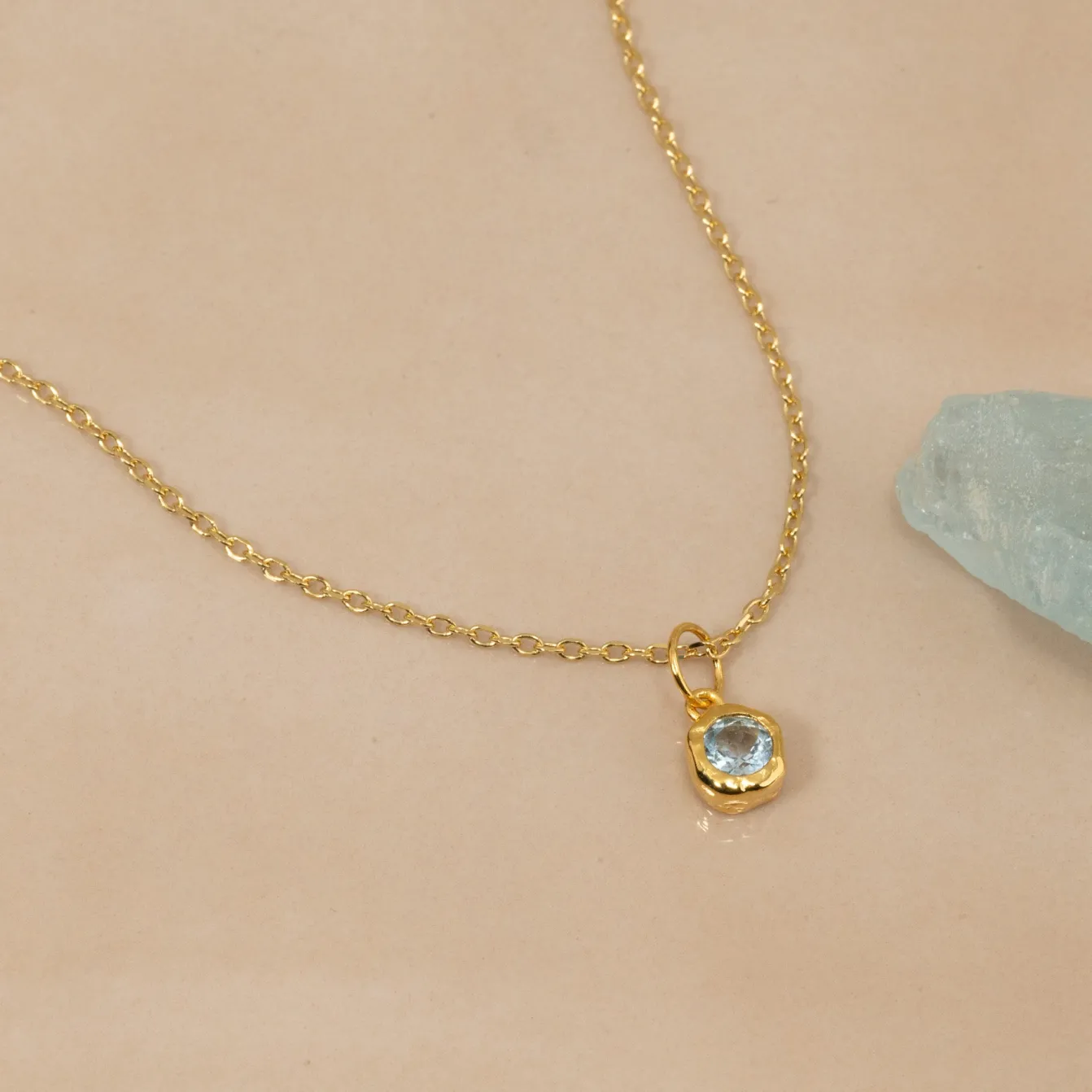 SELENE BLUE TOPAZ GOLDEN PENDANT