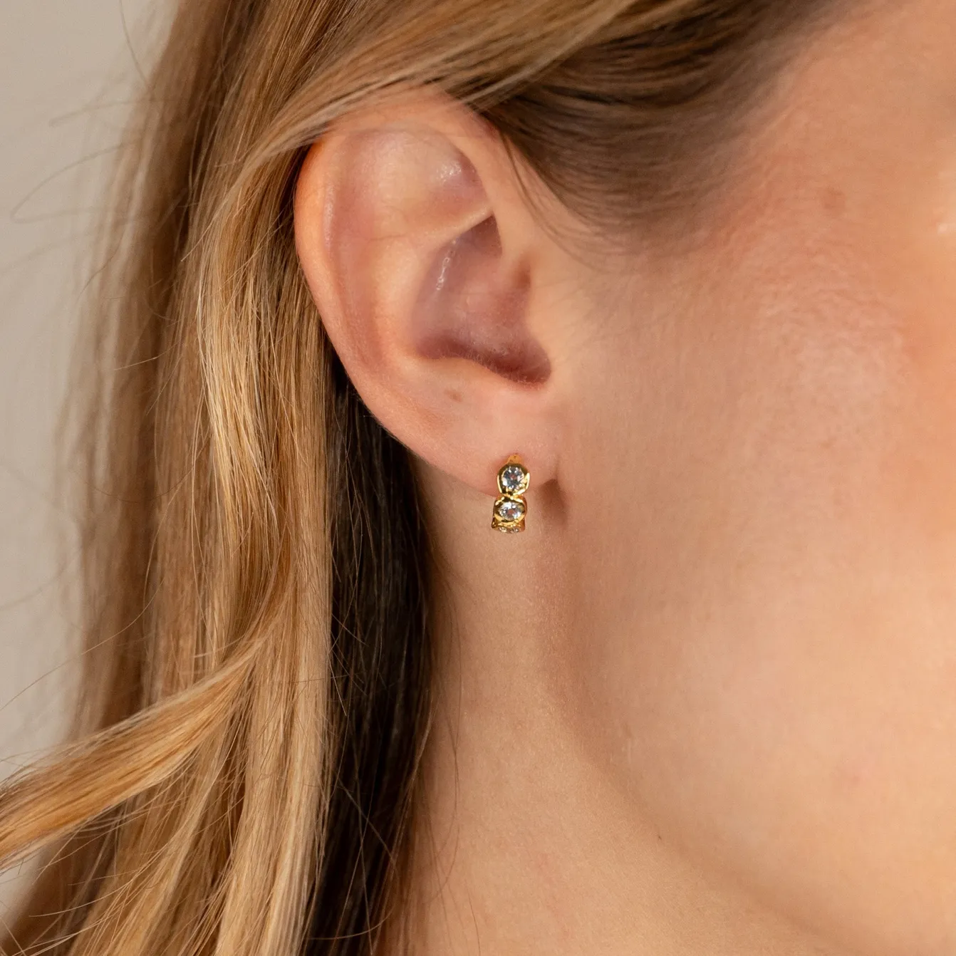 SELENE BLUE TOPAZ GOLDEN HUGGIE EARRING