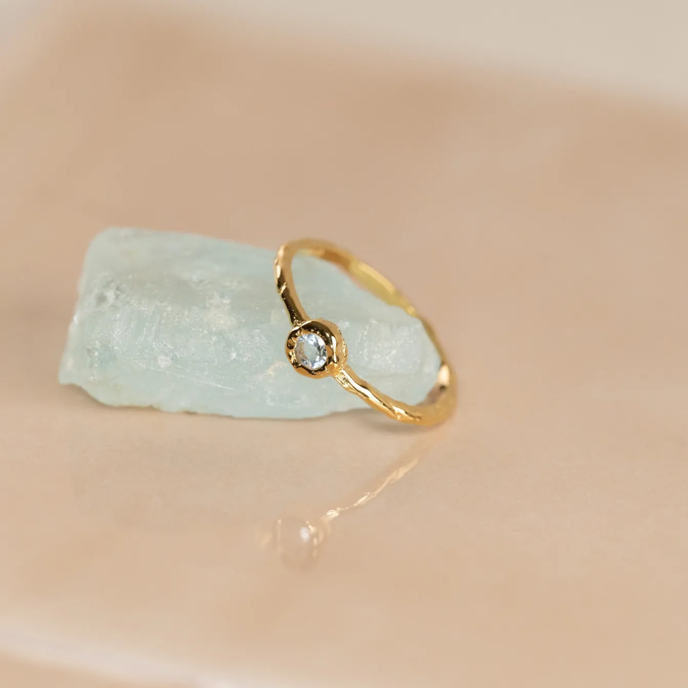 SELENE BLUE TOPAZ GOLDEN RING