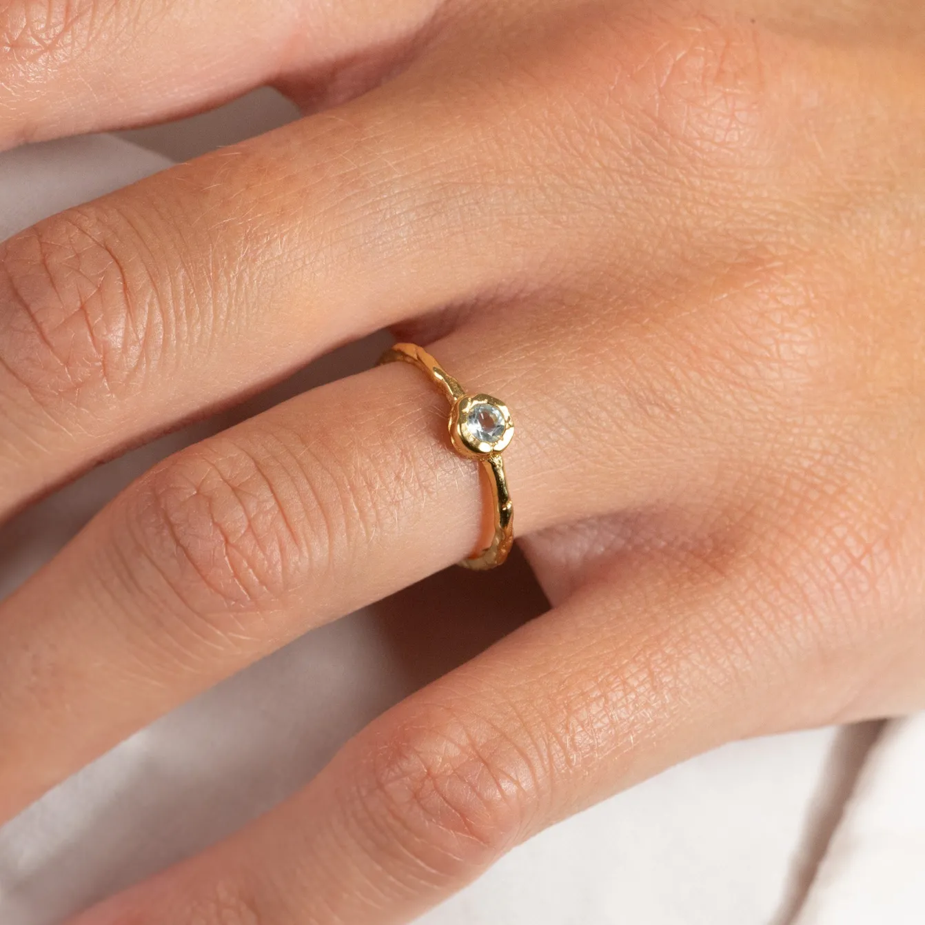 SELENE BLUE TOPAZ GOLDEN RING