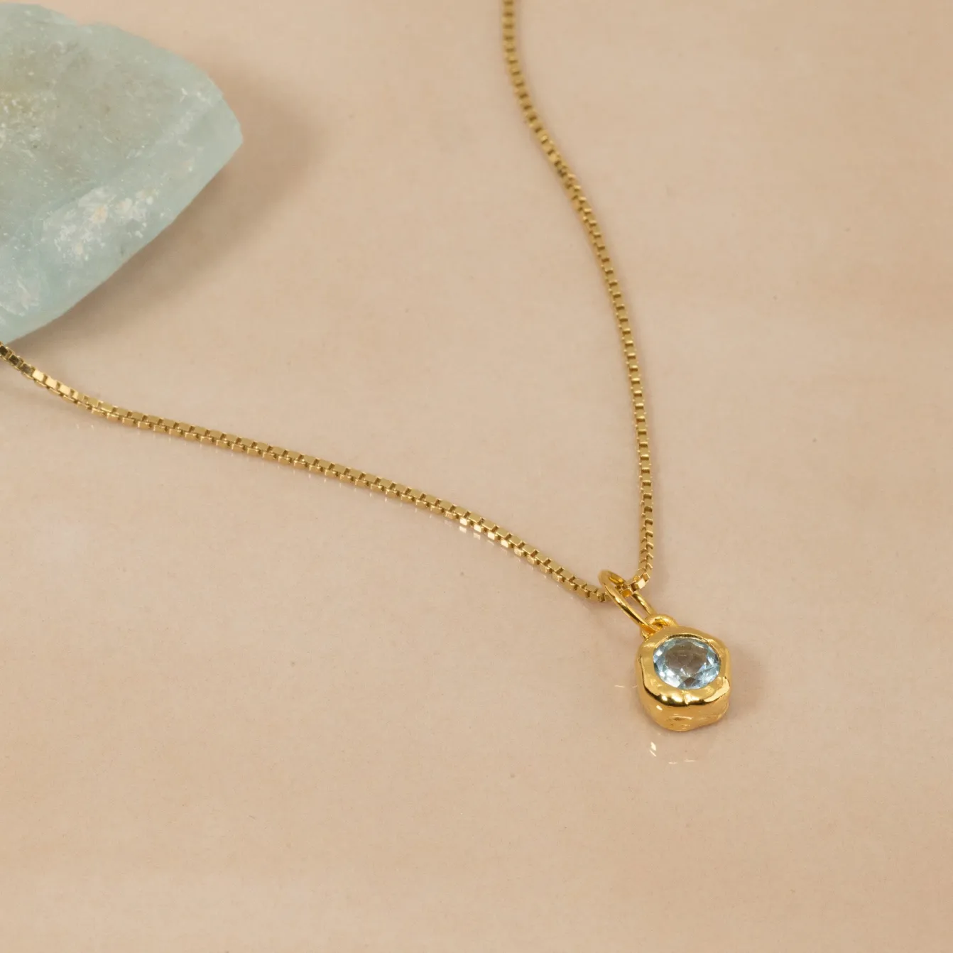 SELENE BLUE TOPAZ GOLDEN PENDANT