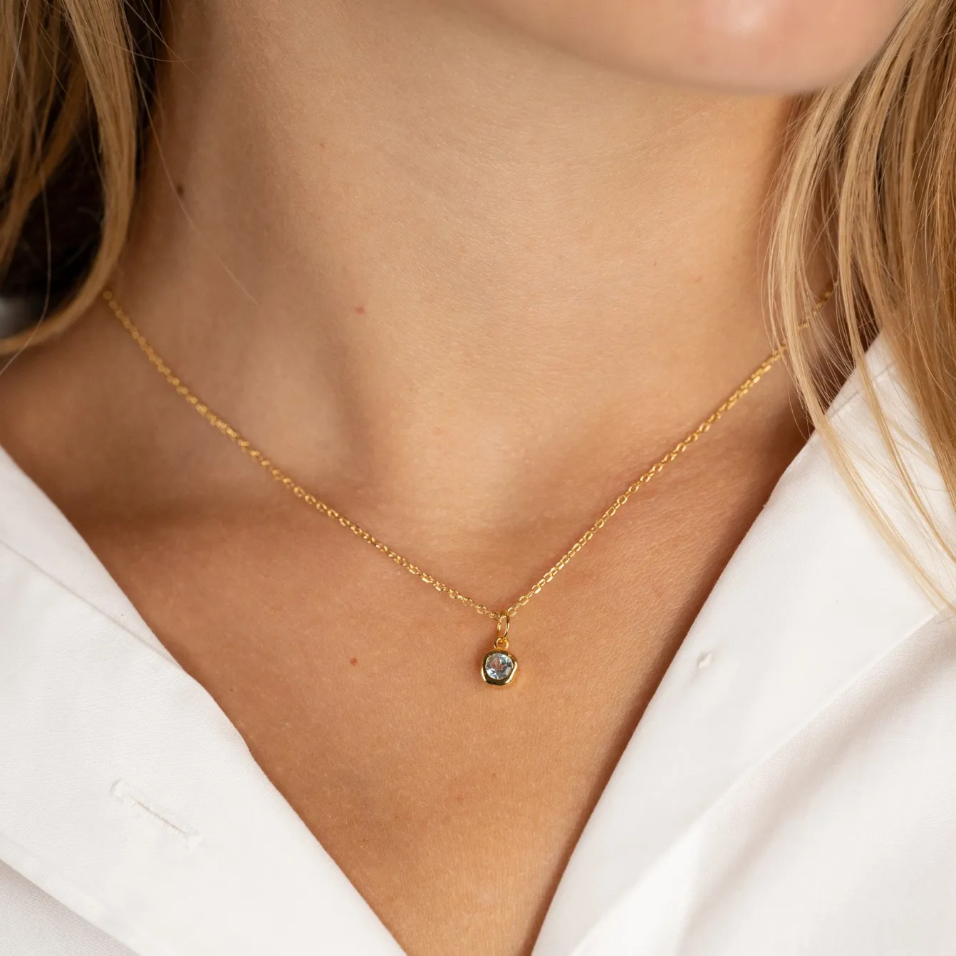SELENE BLUE TOPAZ GOLDEN PENDANT