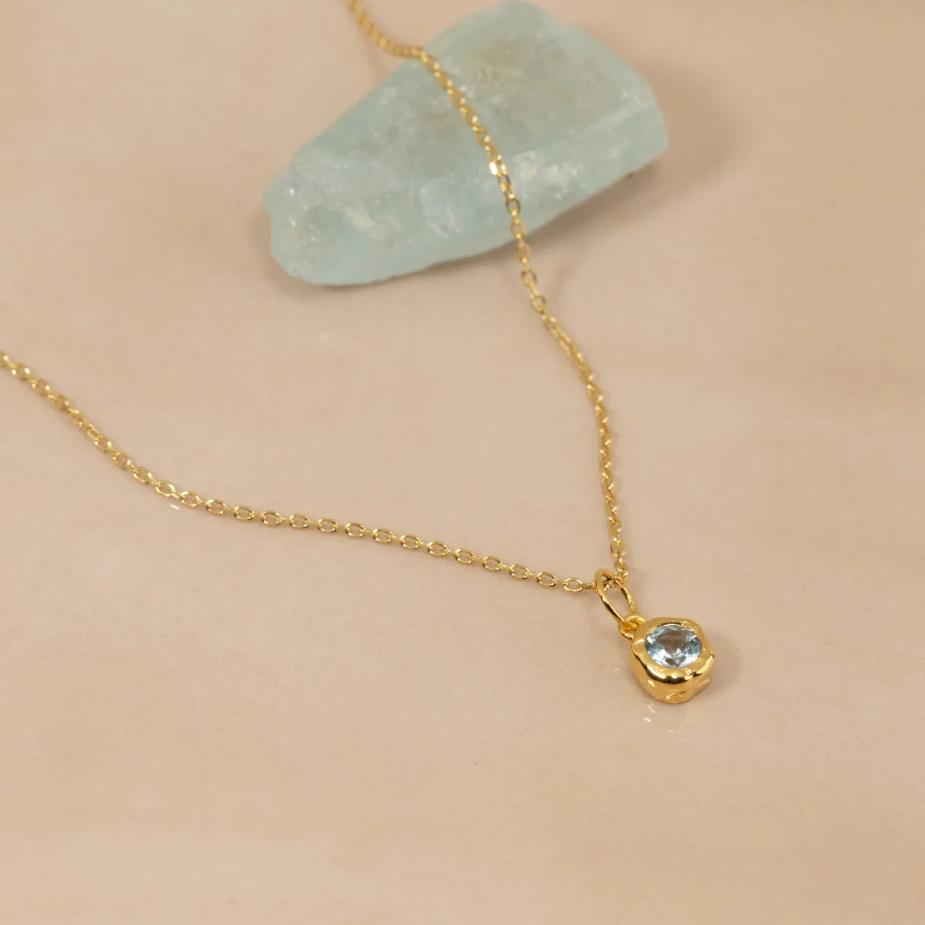 SELENE BLUE TOPAZ GOLDEN PENDANT