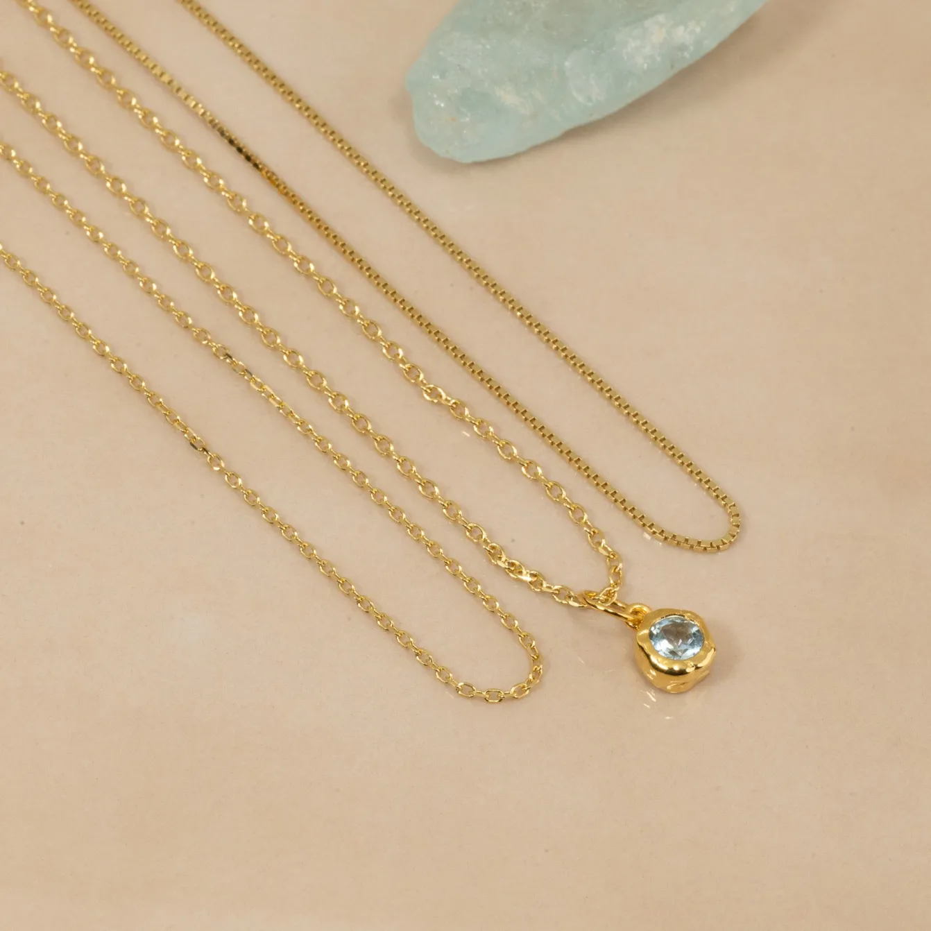 SELENE BLUE TOPAZ GOLDEN PENDANT
