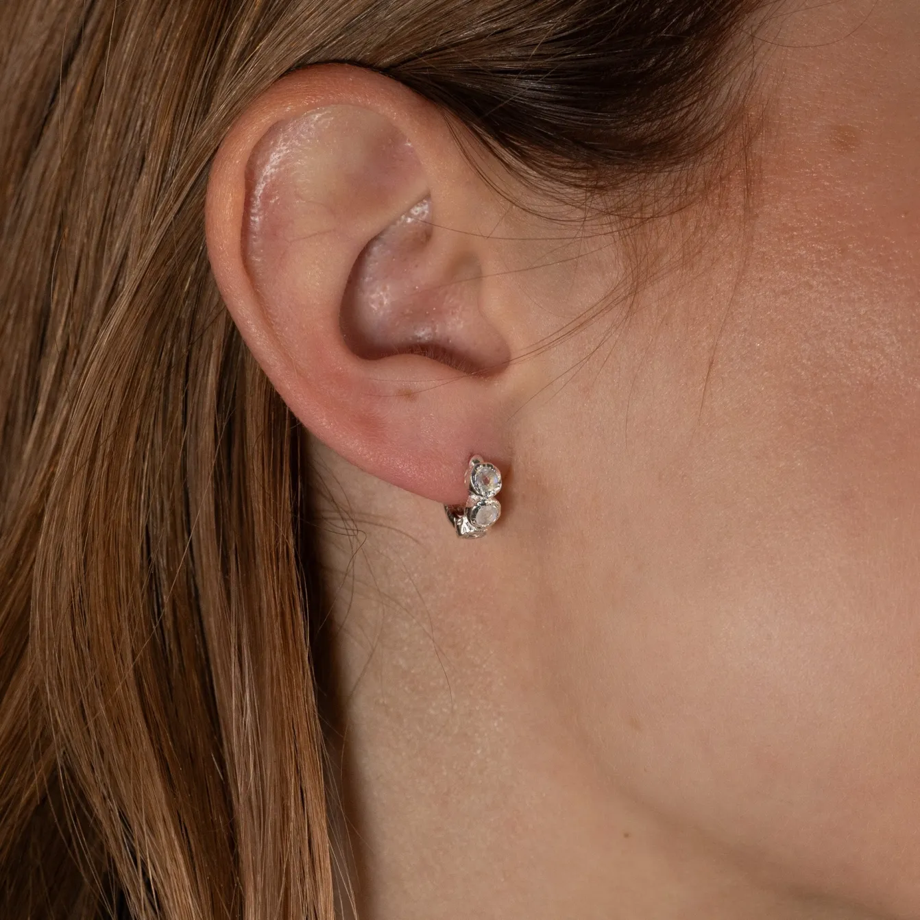 SELENE MOONSTONE SILVER HUGGIE EARRING