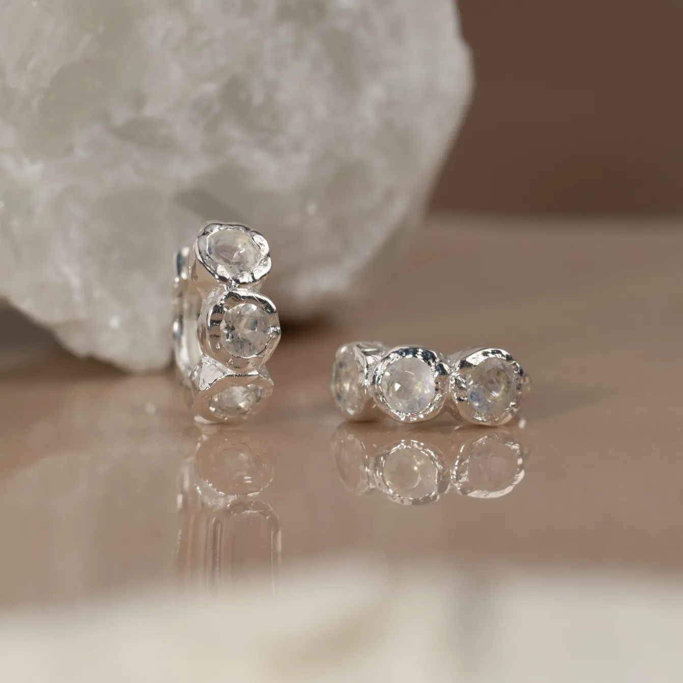 SELENE MOONSTONE SILVER HUGGIE EARRING