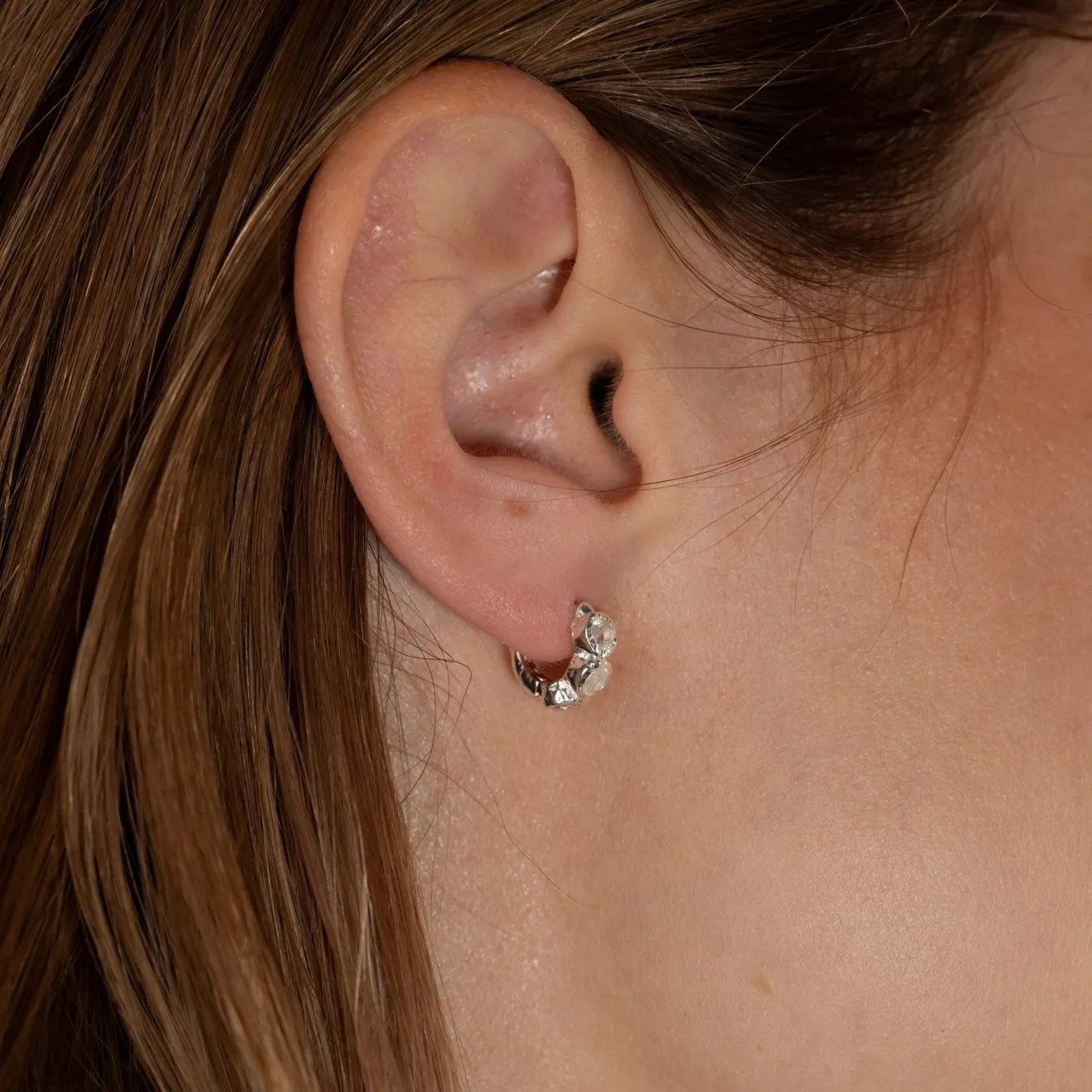 SELENE MOONSTONE SILVER HUGGIE EARRING