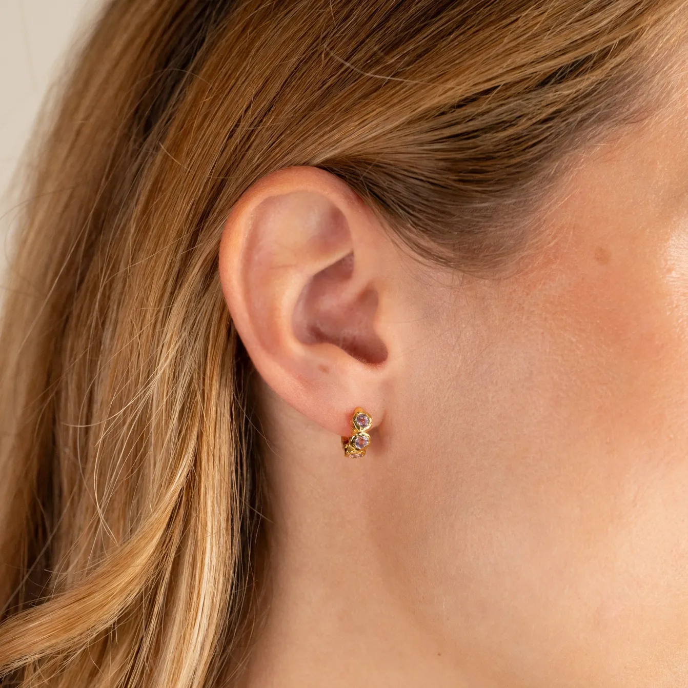 SELENE PURPLE AMETHYST GOLDEN HUGGIE EARRING