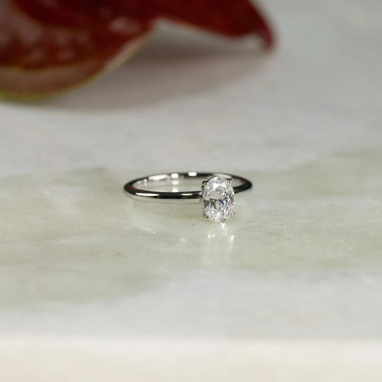 SOLITAIRE OVAL-CUT DIAMOND RING - 0.75ct - WG