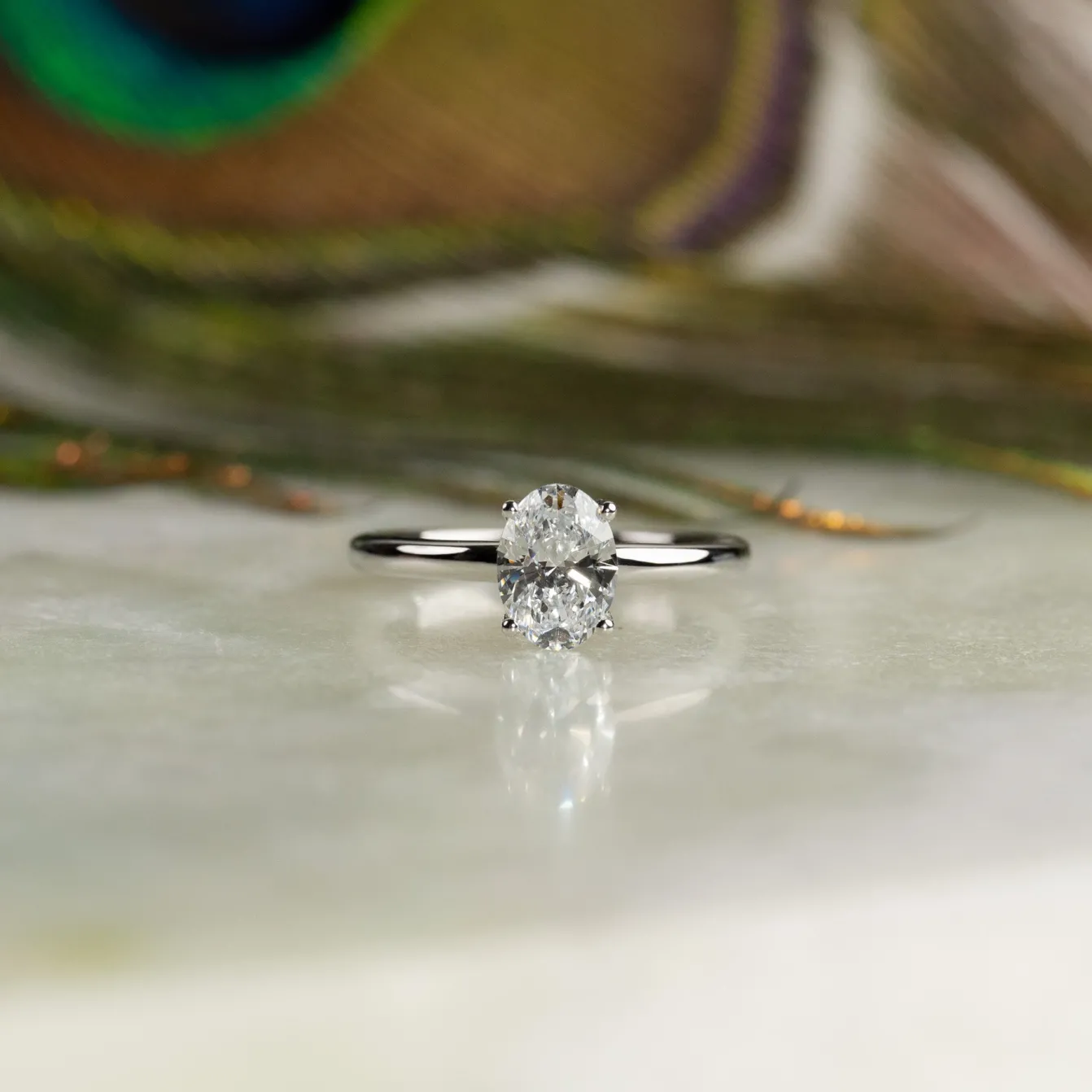 SOLITAIRE OVAL-CUT DIAMOND RING - 1.0ct - WG