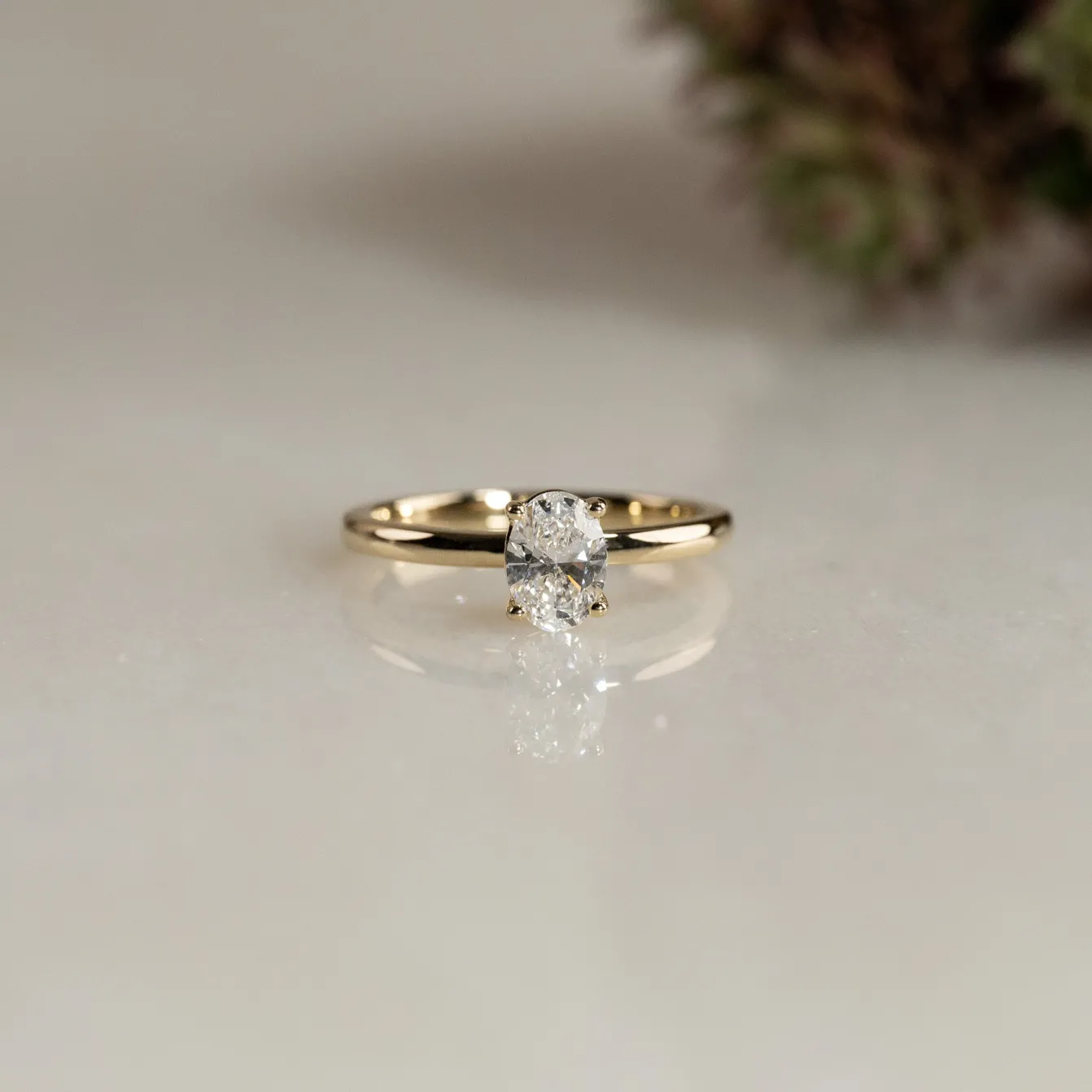SOLITAIRE OVAL-CUT DIAMOND RING - 0.75ct - YG