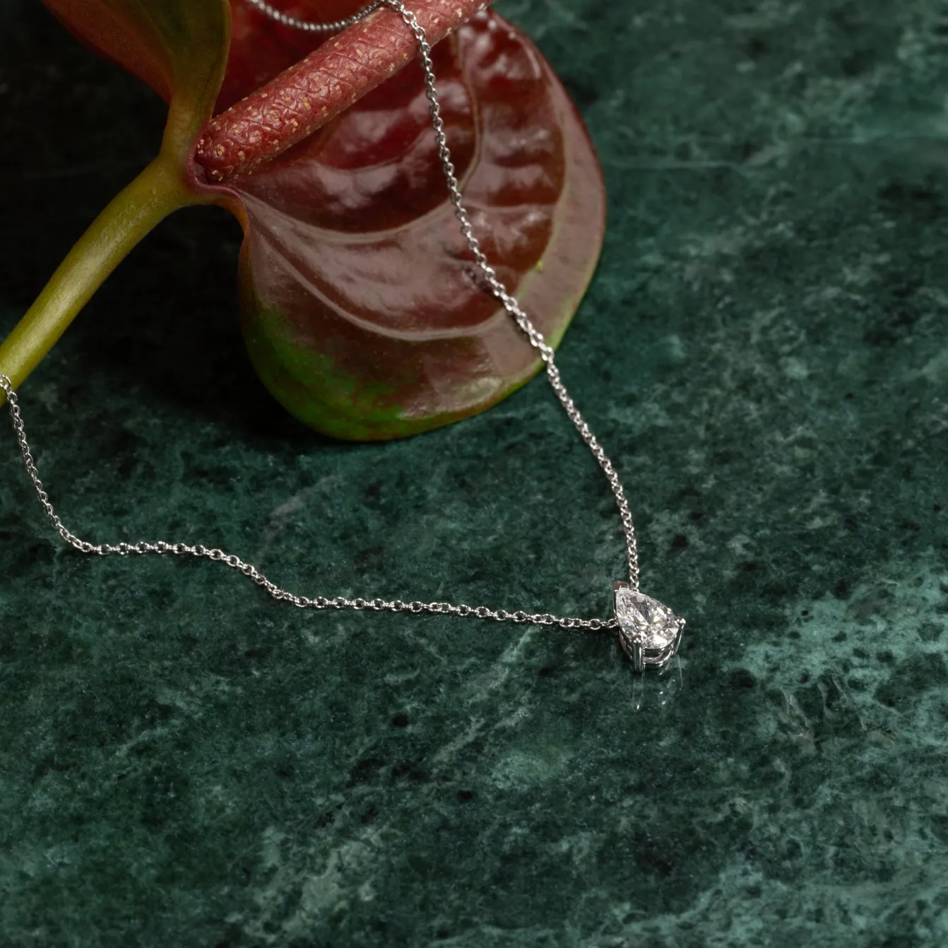 SOLITAIRE PEAR DIAMOND PENDANT - 0.65ct - WG