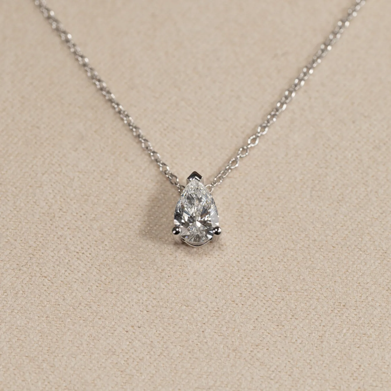 SOLITAIRE PEAR DIAMOND PENDANT - 0.65ct - WG