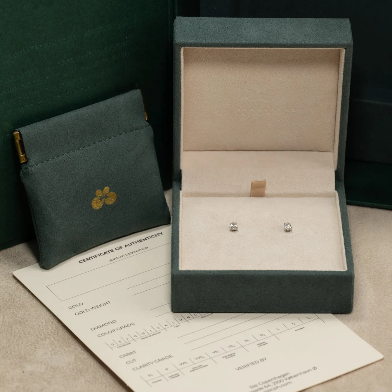 SOLITAIRE PEAR DIAMOND STUD EARRING - 0.5ct - WG