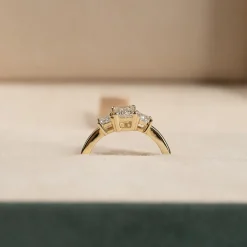 THREE-STONE EMERALD-CUT DIAMOND RING - 1.5ct - YG