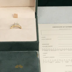 THREE-STONE EMERALD-CUT DIAMOND RING - 1.5ct - YG