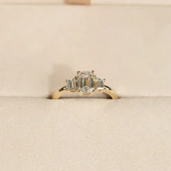 THREE-STONE EMERALD-CUT DIAMOND RING - 1.5ct - YG