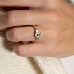 THREE-STONE EMERALD-CUT DIAMOND RING - 1.5ct - YG