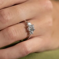 THREE-STONE EMERALD-CUT DIAMOND RING - 1.5ct - WG