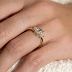 THREE-STONE EMERALD-CUT DIAMOND RING - 1.5ct - YG
